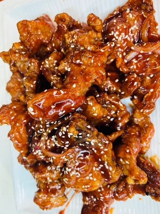 105 蜜汁猪排 HONEY GARLIC PORK CHOP.