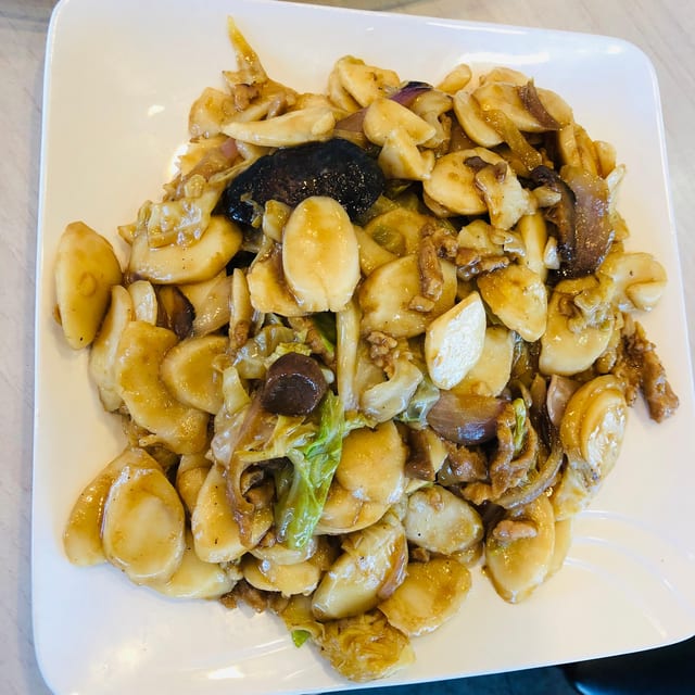 59 腊味炒年糕 PRESERVED MEAT RICE CAKE.